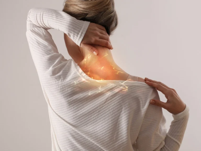 A woman in Lubbock, TX struggles with Neck pain and needs chiropractic neck pain treatment from Dr. Brett Chavez, D.C.